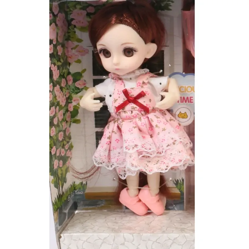 عروسک مدل دختر چشم تیله ای طرح چرخ بستنی ارتفاع 16 سانتی متر